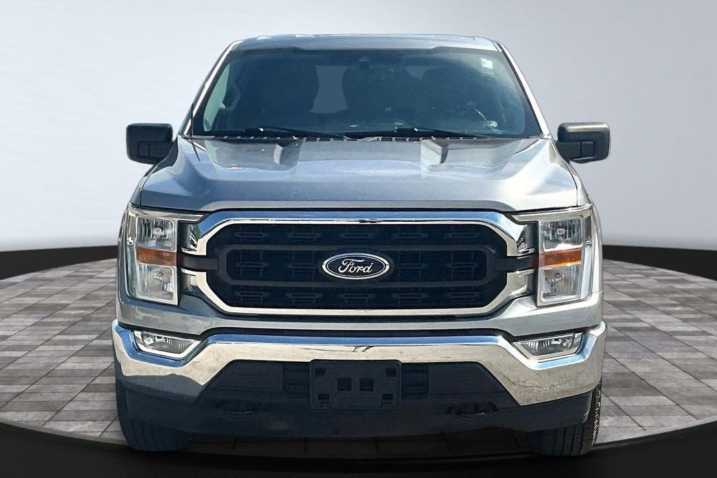 Used 2021 Ford F-150 XLT with VIN 1FTFW1E56MKD57504 for sale in Kansas City